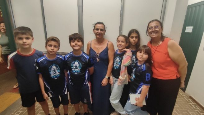 Equipe com apoiadoras